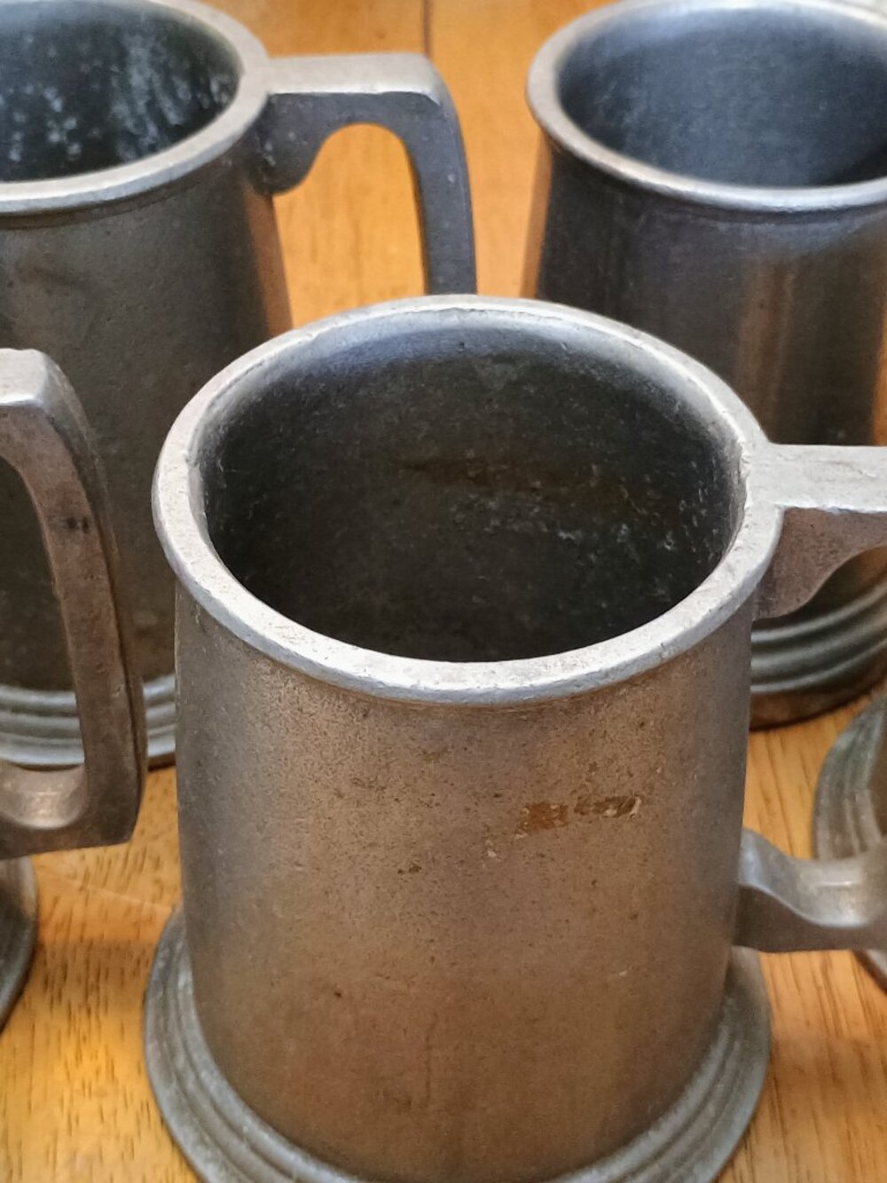 5 pewter mugs